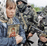 В 2014 году мирное население Донбасса пыталось остановить украинские войска словом. Сегодня мало кто решается открыто высказывать свое отношение к ВСУ. Фото: AFP/EAST NEWS - Комсомольская Правда Самара