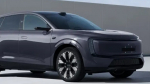 «Ауди» без четырех колец: новый кроссовер AUDI E7X сняли на официальное фото